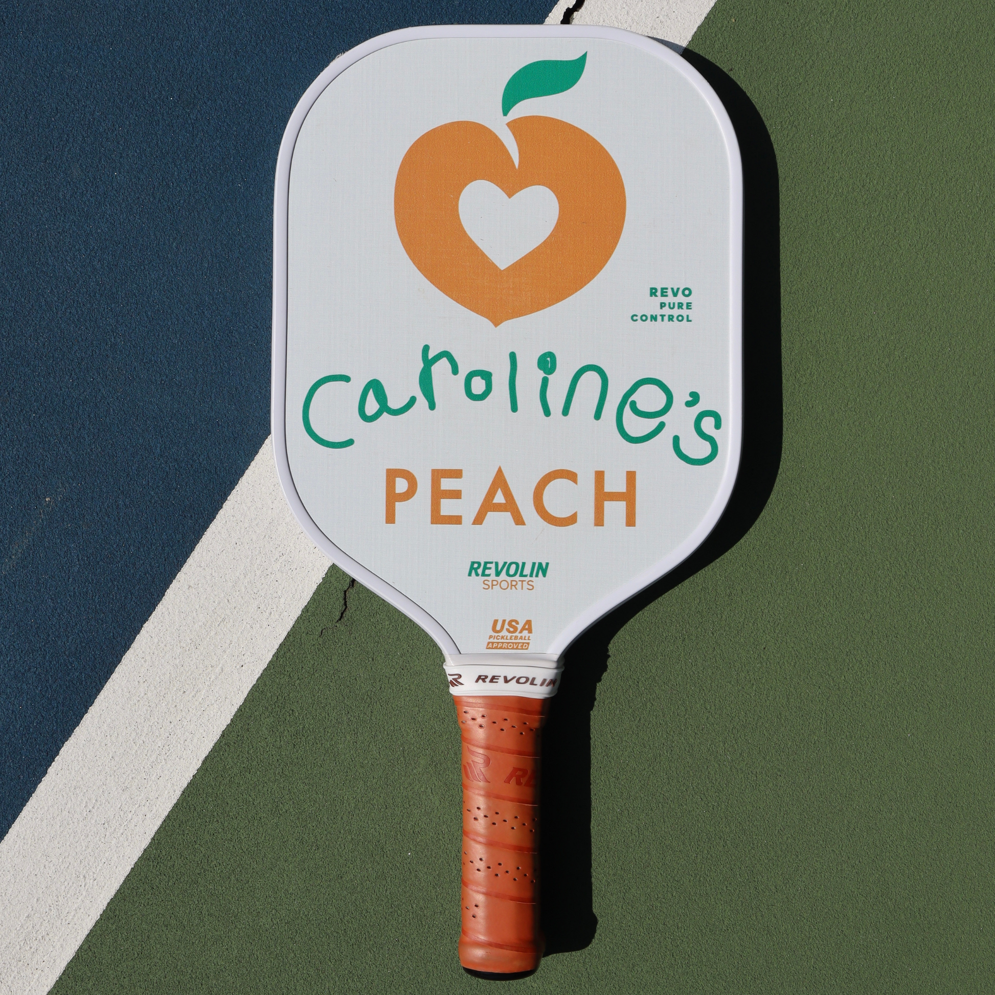 Peach pickleball paddle front